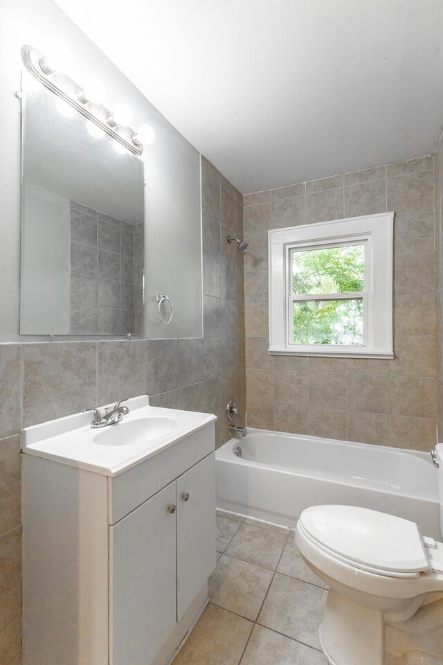 1812 John Ross Rd, Chattanooga, TN 37412 - full bath featuring tile walls, tile patterned floors, shower / bath combination, toilet, and vanity