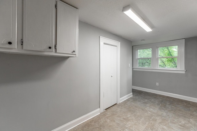 1812 John Ross Rd, Chattanooga, TN 37412 - unfurnished room featuring baseboards and a textured ceiling