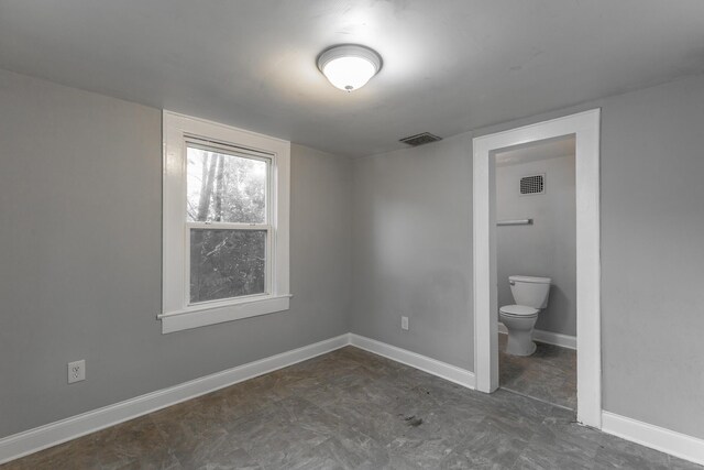 1812 John Ross Rd, Chattanooga, TN 37412 - unfurnished bedroom with baseboards and ensuite bathroom