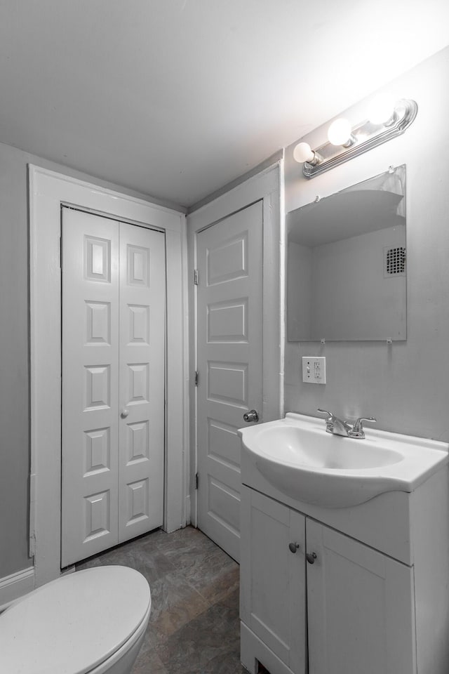 1812 John Ross Rd, Chattanooga, TN 37412 - bathroom featuring vanity and toilet