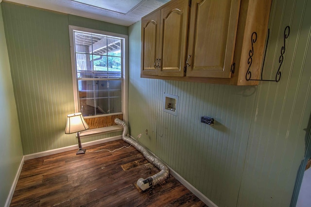 laundry area featuring cabinet space, baseboards, dark wood-style floors, and hookup for a washing machine