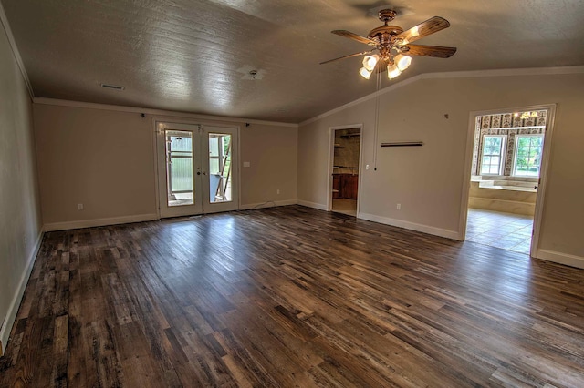 unfurnished living room featuring a ceiling fan, dark wood finished floors, and a wealth of natural light