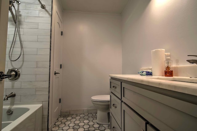 bathroom with crown molding, toilet, tub / shower combination, and vanity