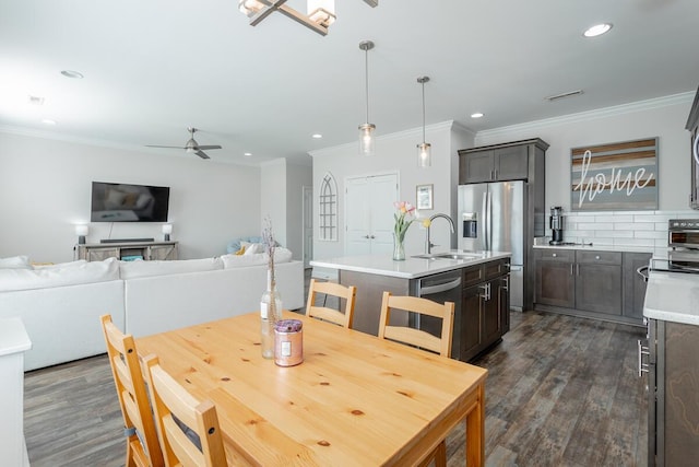 1826 Seven Pines Ln, Chattanooga, TN 37415 - dining space featuring a ceiling fan, recessed lighting, crown molding, and dark wood-style floors