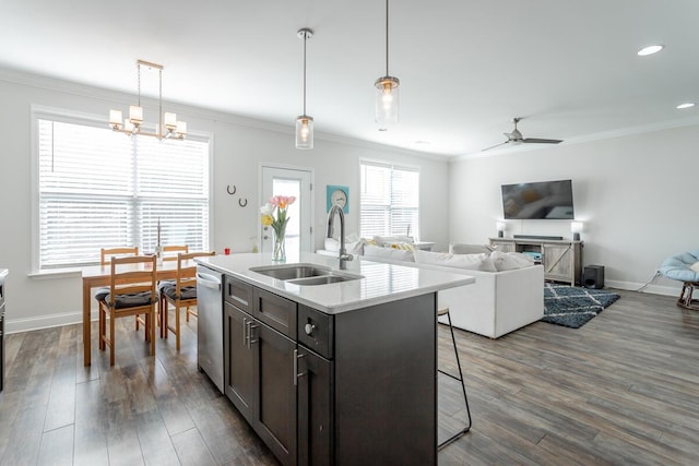 1826 Seven Pines Ln, Chattanooga, TN 37415 - kitchen featuring a sink, stainless steel dishwasher, a kitchen breakfast bar, ceiling fan, and crown molding
