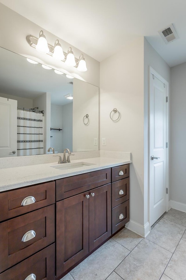 1826 Seven Pines Ln, Chattanooga, TN 37415 - full bathroom with tile patterned floors, baseboards, and vanity