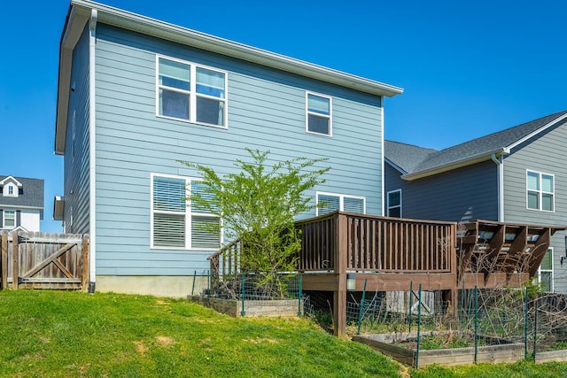 1826 Seven Pines Ln, Chattanooga, TN 37415 - back of property featuring a vegetable garden and a deck
