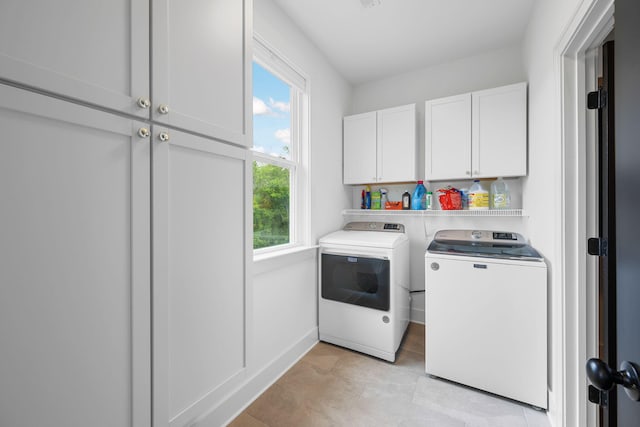 613 Ladd Ave, Chattanooga, TN 37405 - washroom featuring a healthy amount of sunlight, separate washer and dryer, light tile patterned floors, and cabinet space