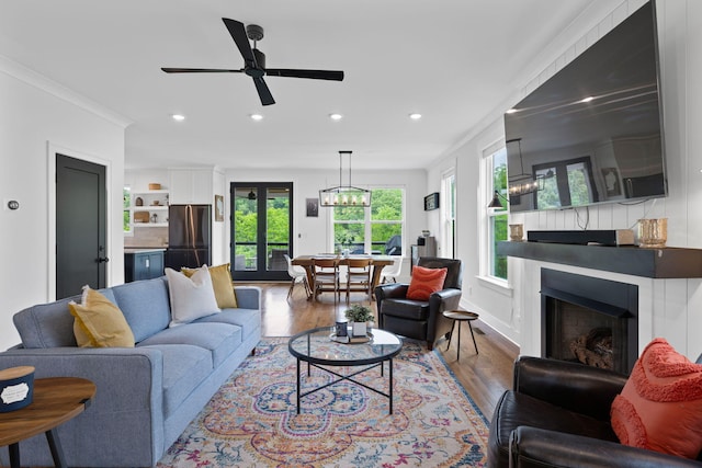613 Ladd Ave, Chattanooga, TN 37405 - living room featuring a fireplace, recessed lighting, baseboards, a ceiling fan, and wood finished floors