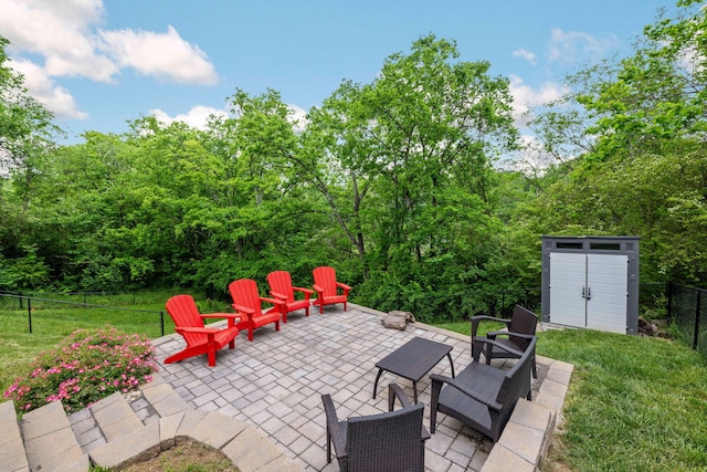 613 Ladd Ave, Chattanooga, TN 37405 - view of patio / terrace with an outbuilding, fence, and a storage shed