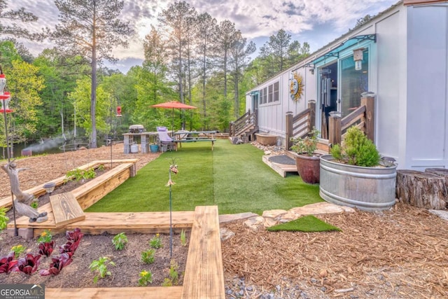 view of yard featuring a garden