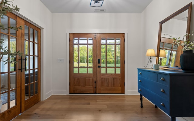 6949 Sawyer Rd, Signal Mountain, TN 37377 - entryway featuring french doors and wood finished floors
