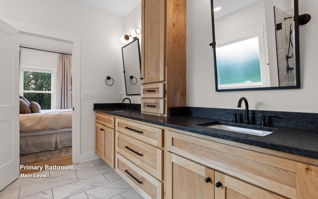 6949 Sawyer Rd, Signal Mountain, TN 37377 - full bath with double vanity, marble look tile flooring, and connected bathroom