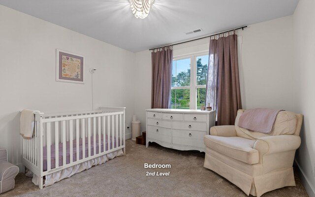 6949 Sawyer Rd, Signal Mountain, TN 37377 - bedroom with carpet and a crib