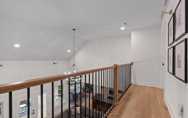 6949 Sawyer Rd, Signal Mountain, TN 37377 - hall featuring wood finished floors, a chandelier, lofted ceiling, and recessed lighting
