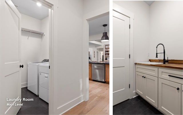 6949 Sawyer Rd, Signal Mountain, TN 37377 - washroom featuring washer and dryer and dark wood-type flooring
