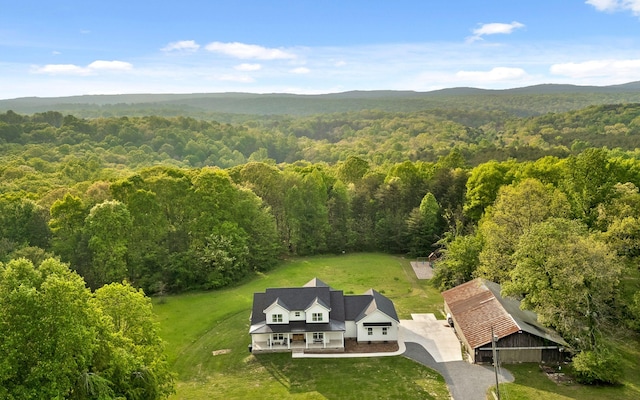 6949 Sawyer Rd, Signal Mountain, TN 37377 - aerial view of property and surrounding area with a forest and a mountain backdrop