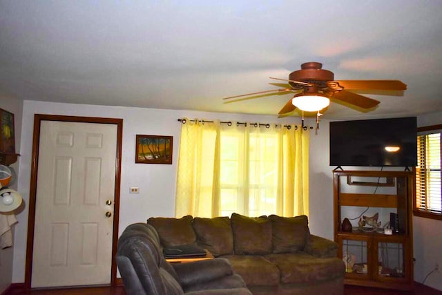 living room featuring ceiling fan