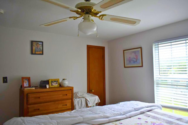 bedroom featuring ceiling fan