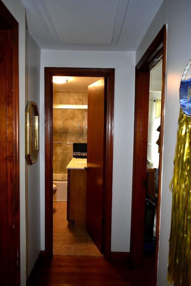 corridor with wood finished floors