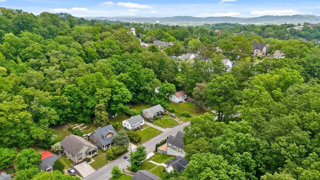 bird's eye view with a residential view and a wooded view
