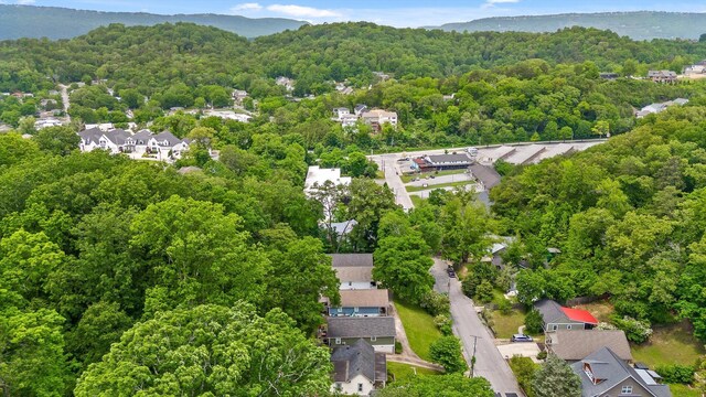 aerial view with a residential view and a wooded view