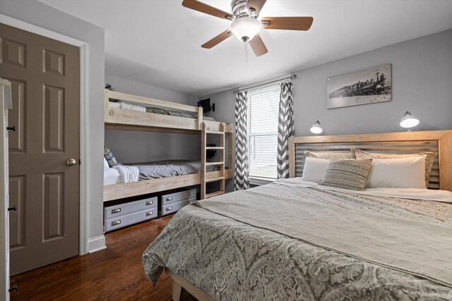 bedroom with ceiling fan and wood finished floors