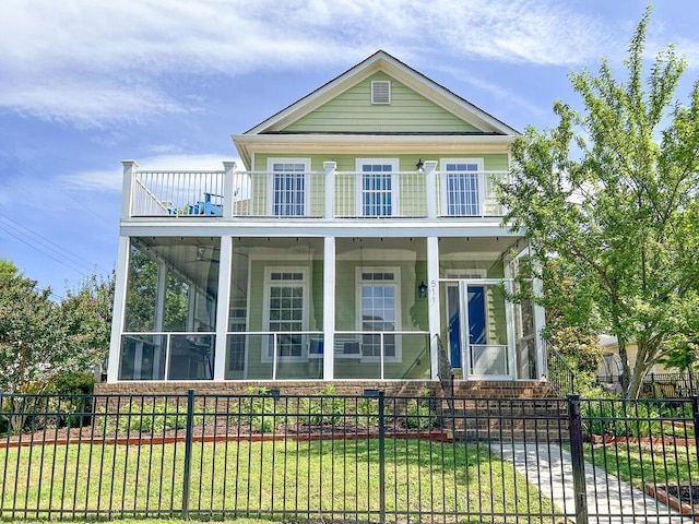 511 Colby St, Chattanooga, TN 37405 - view of front of house featuring a balcony and a sunroom