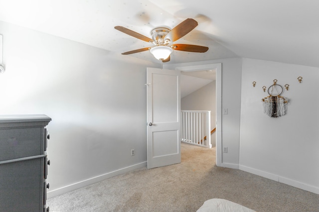 225 Hemphill Ave, Chattanooga, TN 37411 - unfurnished bedroom featuring light colored carpet, baseboards, ceiling fan, and vaulted ceiling