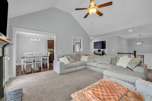living room with wood finished floors, carpet floors, high vaulted ceiling, ceiling fan with notable chandelier, and recessed lighting