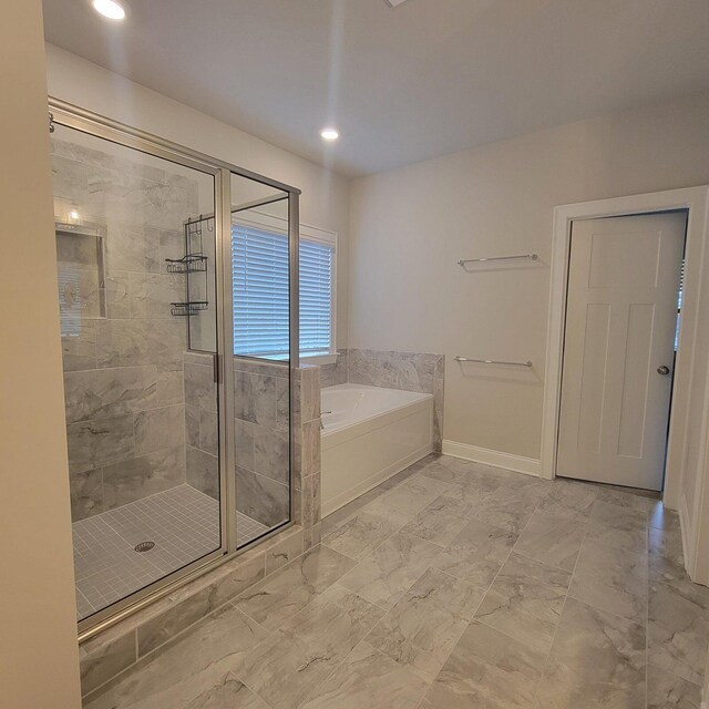 9573 Hastings Way, Ooltewah, TN 37363 - bathroom with recessed lighting, a garden tub, a stall shower, and marble finish floor