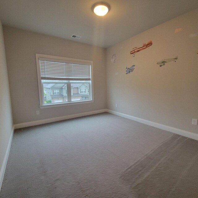 9573 Hastings Way, Ooltewah, TN 37363 - carpeted spare room with baseboards and visible vents