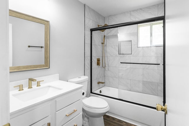 1204 N Long Hollow Rd, Chickamauga, GA 30707 - bathroom featuring vanity, toilet, shower / bath combination with glass door, and wood finished floors