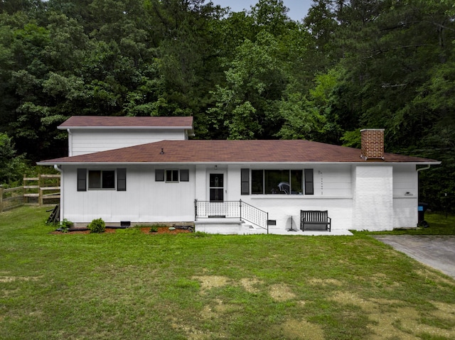 1204 N Long Hollow Rd, Chickamauga, GA 30707 - view of front of property featuring a chimney, a forest view, crawl space, and a shingled roof