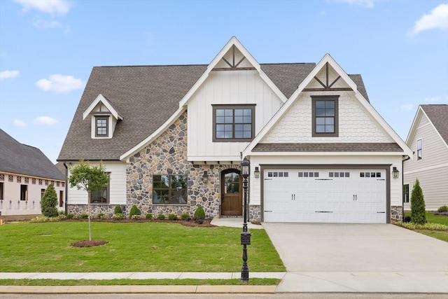 craftsman inspired home featuring stone siding, board and batten siding, driveway, and roof with shingles