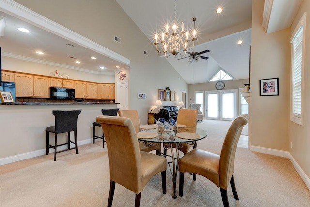 dining space with visible vents, light colored carpet, baseboards, ceiling fan with notable chandelier, and recessed lighting