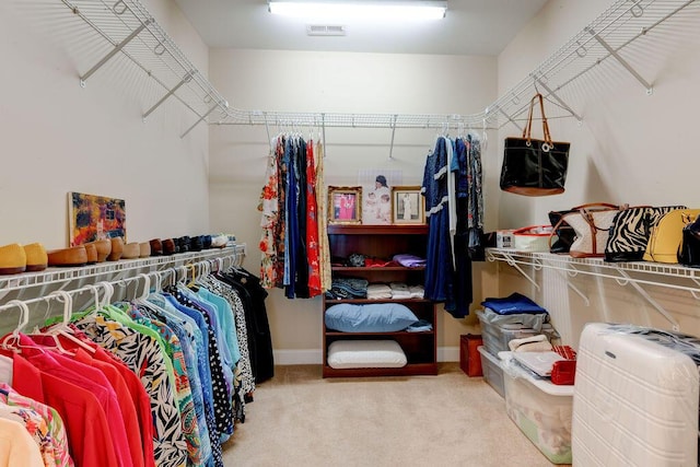 spacious closet featuring carpet floors and visible vents