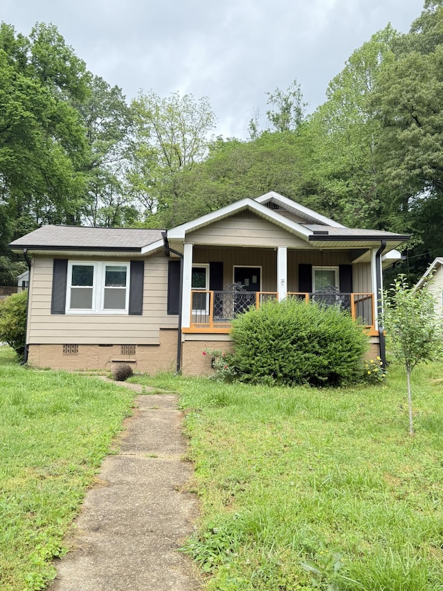 1021 W Elmwood Dr, Chattanooga, TN 37405 - view of front of home featuring board and batten siding, roof with shingles, covered porch, and crawl space