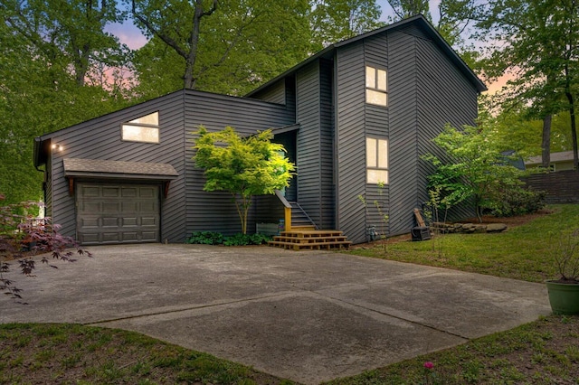 612 Carolina Ave, Signal Mountain, TN 37377 - view of side of property featuring an attached garage and concrete driveway