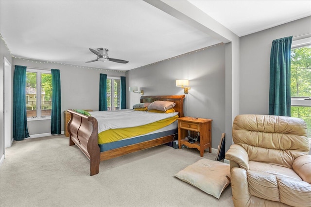 612 Carolina Ave, Signal Mountain, TN 37377 - carpeted bedroom with baseboards, ceiling fan, and multiple windows