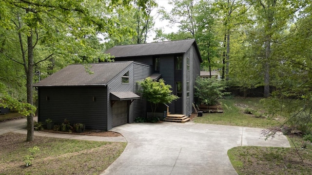 612 Carolina Ave, Signal Mountain, TN 37377 - view of front of home with a garage, roof with shingles, and driveway