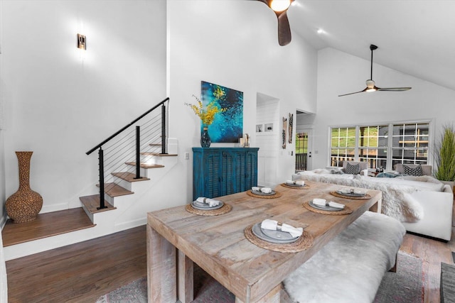 332 Oliver St, Chattanooga, TN 37405 - dining area with ceiling fan, wood finished floors, high vaulted ceiling, stairs, and baseboards