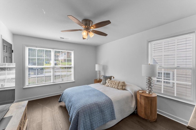 332 Oliver St, Chattanooga, TN 37405 - bedroom featuring baseboards, wood finished floors, and a ceiling fan