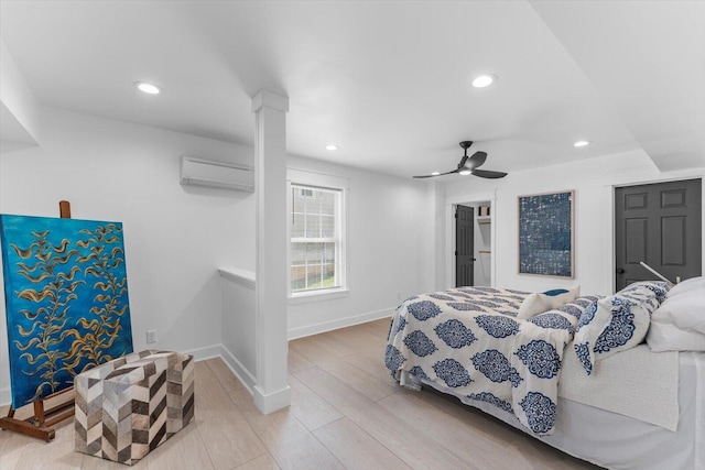 332 Oliver St, Chattanooga, TN 37405 - bedroom featuring wood finished floors, an AC wall unit, recessed lighting, baseboards, and ceiling fan
