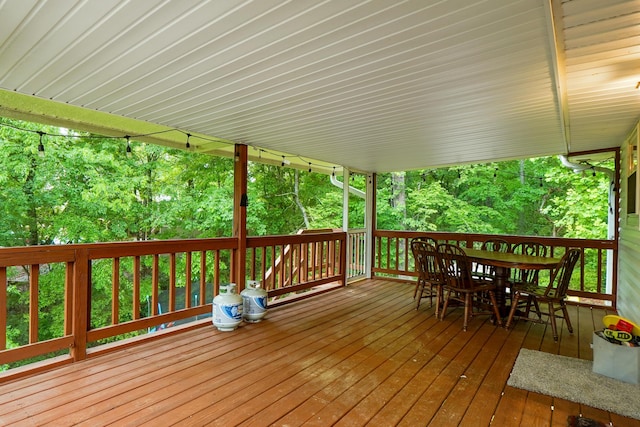 deck featuring outdoor dining area