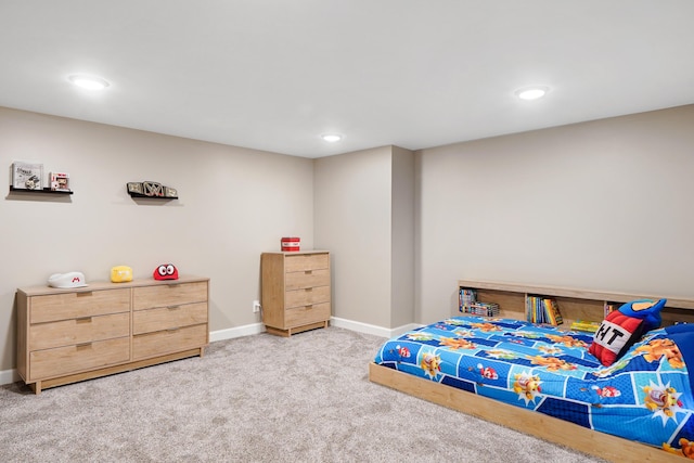 bedroom with recessed lighting, baseboards, and carpet floors