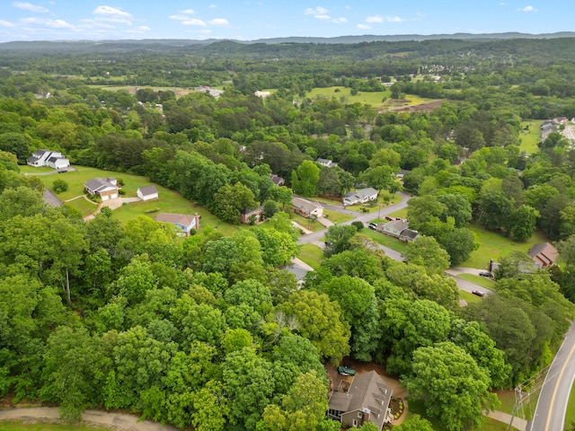 bird's eye view with a forest view