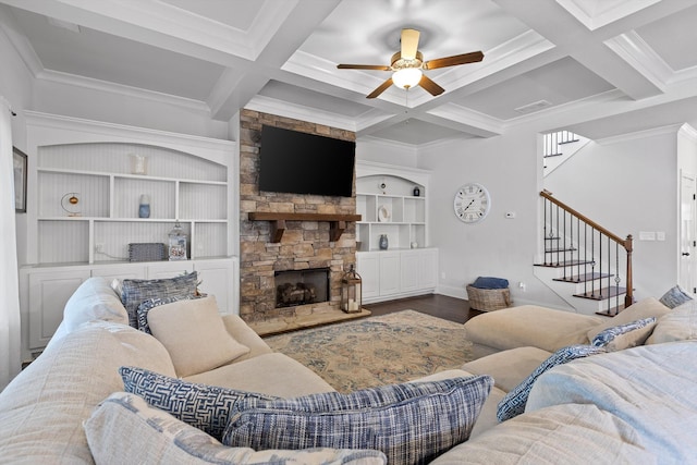 9726 Haven Port Ln, Ooltewah, TN 37363 - living area featuring a ceiling fan, coffered ceiling, a stone fireplace, stairs, and wood finished floors