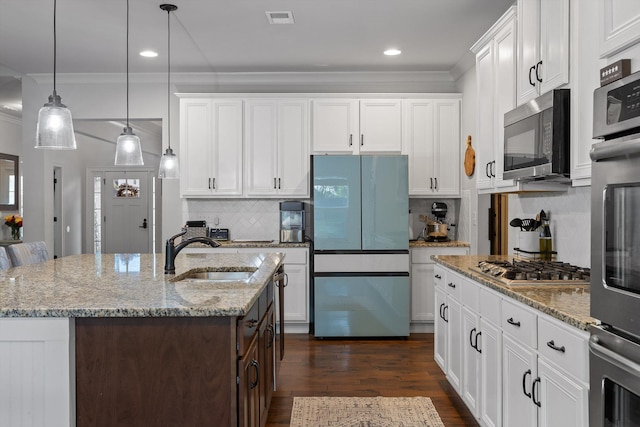 9726 Haven Port Ln, Ooltewah, TN 37363 - kitchen with a sink, stainless steel appliances, white cabinets, visible vents, and dark wood-style flooring