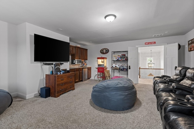 9726 Haven Port Ln, Ooltewah, TN 37363 - living area with light colored carpet, baseboards, and a chandelier